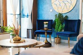 Aina Residency Beachfront Hotel