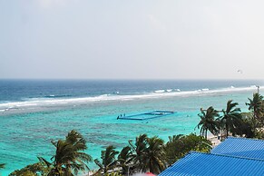 Aina Residency Beachfront Hotel
