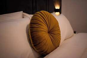 Aina Residency Beachfront Hotel