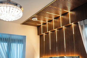 Aina Residency Beachfront Hotel