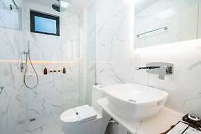 Aina Residency Beachfront Hotel