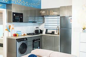 Aina Residency Beachfront Hotel