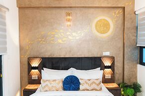 Aina Residency Beachfront Hotel