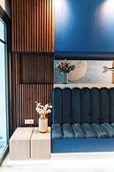 Aina Residency Beachfront Hotel