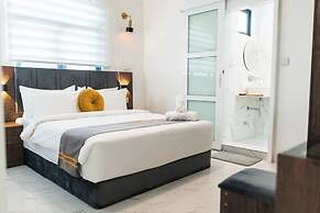 Aina Residency Beachfront Hotel