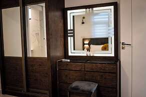 Aina Residency Beachfront Hotel