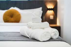 Aina Residency Beachfront Hotel