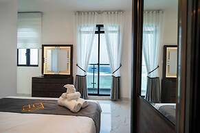 Aina Residency Beachfront Hotel