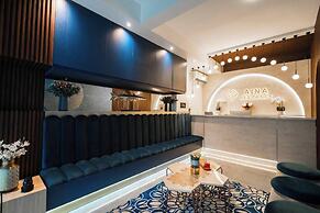Aina Residency Beachfront Hotel