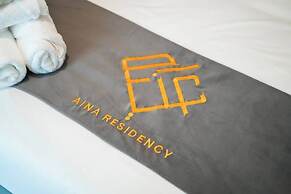 Aina Residency Beachfront Hotel