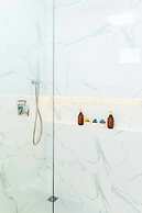 Aina Residency Beachfront Hotel