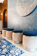 Aina Residency Beachfront Hotel