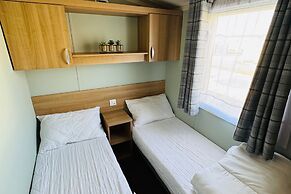 Statichome-sleeps6-lakeview-balcony-parking-petsok