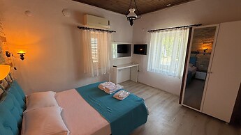 Assos Mia Konaklama ve Restaurant