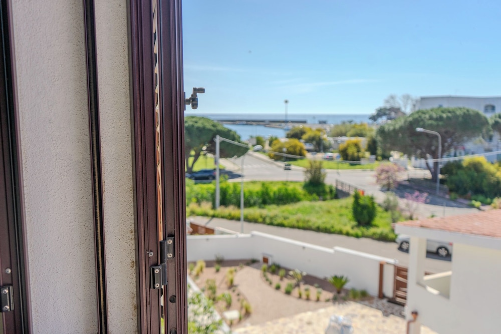 Porto Apartments - La Caletta