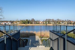 Apartment in Dziwnow With River View & Spa