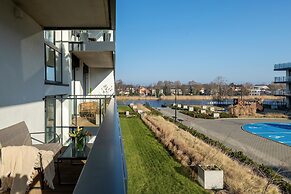 Apartment in Dziwnow With River View & Spa