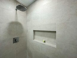 Steps to Sandy Beach Pool Renovated 2BR Condo