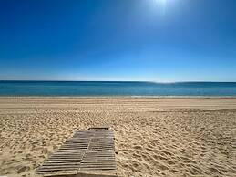 Steps to Sandy Beach Pool Renovated 2BR Condo