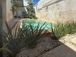 Casa con Piscina Nido Rosa