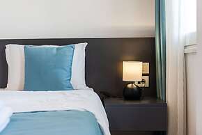 Spacious 1BR Apartment With Resort Access
