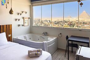 Xuru Stays I Jacuzzi Studios @ The Pyramids