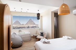 Xuru Stays I Jacuzzi Studios @ The Pyramids