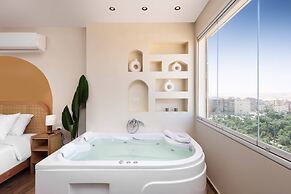 Xuru Stays I Jacuzzi Studios @ The Pyramids