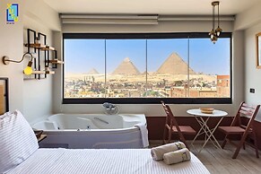 Xuru Stays I Jacuzzi Studios @ The Pyramids