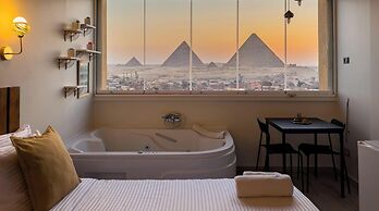 Xuru Stays I Jacuzzi Studios @ The Pyramids
