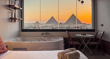 Xuru Stays I Jacuzzi Studios @ The Pyramids