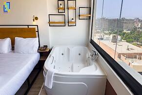 Xuru Stays I Jacuzzi Studios @ The Pyramids