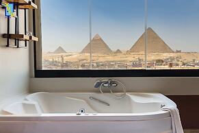 Xuru Stays I Jacuzzi Studios @ The Pyramids