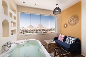 Xuru Stays I Jacuzzi Studios @ The Pyramids