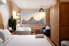 Xuru Stays I Jacuzzi Studios @ The Pyramids