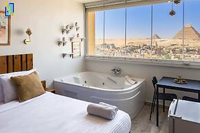 Xuru Stays I Jacuzzi Studios @ The Pyramids