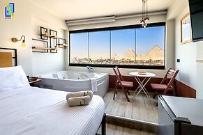Xuru Stays I Jacuzzi Studios @ The Pyramids