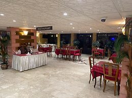 Alfursan Almotahida Hotel Alhamraa dist