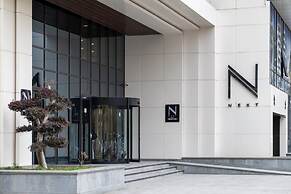 Next Apartments Official