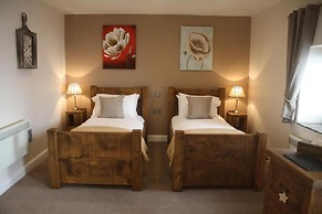 HOMESLY THE WOODMAN INN LTD