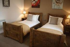 HOMESLY THE WOODMAN INN LTD