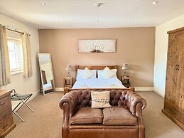 HOMESLY THE WOODMAN INN LTD
