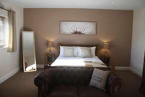 HOMESLY THE WOODMAN INN LTD