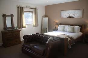 HOMESLY THE WOODMAN INN LTD