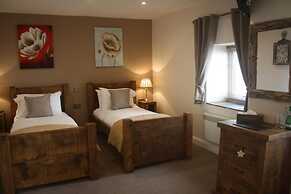 HOMESLY THE WOODMAN INN LTD