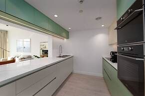 Chic 2BR Downtown Haven w Balcony City Views