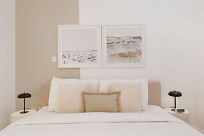 Chic 2BR Downtown Haven w Balcony City Views