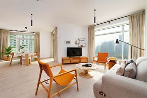 Chic 2BR Downtown Haven w Balcony City Views