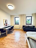 Cozy 3BR Apt with Garden Sleeps 10