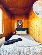 Cozy 3BR Apt with Garden Sleeps 10